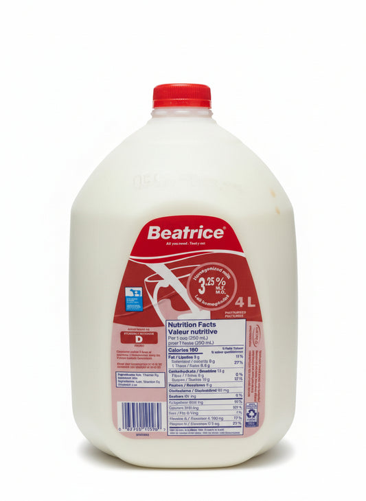 Beatrice milk bottle with label on a blurred background