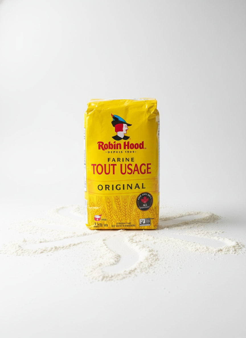 Bag of Robin Hood flour with branding and text on a white background