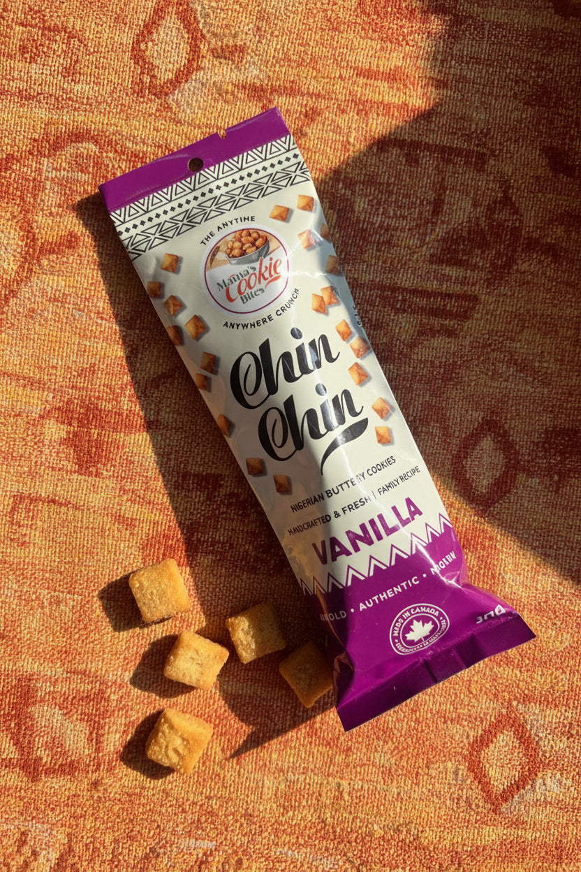 A single stick of Mochi Cookie Hills Chin Chin Vanilla snack bars lying on a wooden surface.