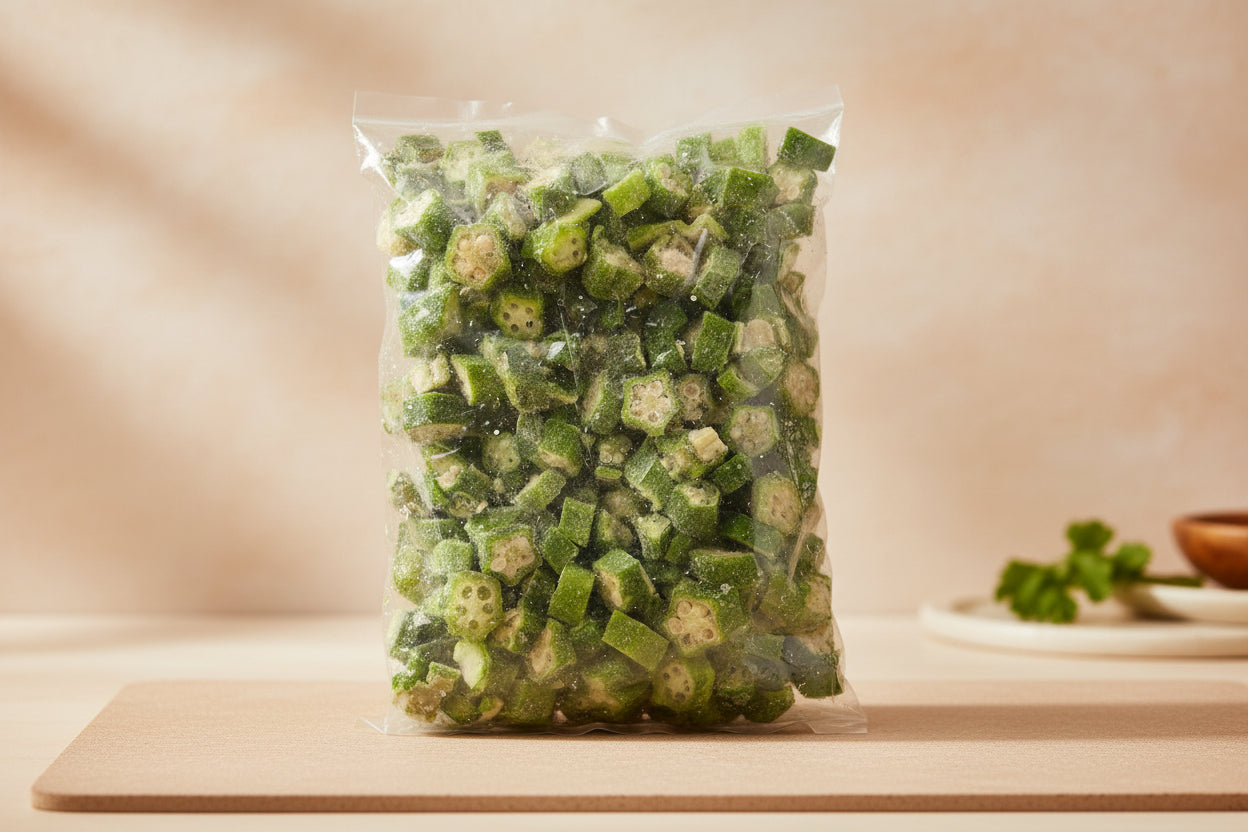 Bag of frozen green vegetables on a metal surface