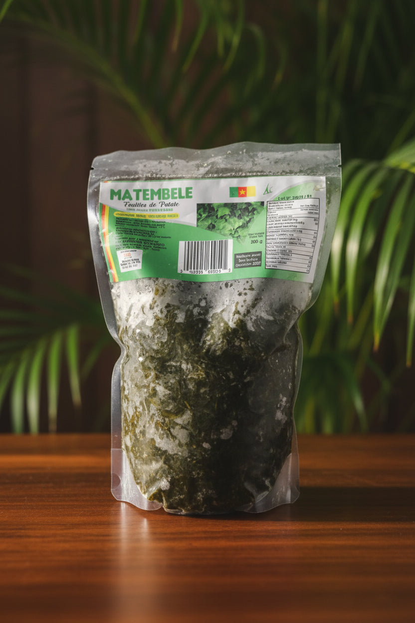 A packaged dark, irregularly shaped food product in clear plastic packaging with a green and white label reading 'MATEMBELE' and a barcode, photographed on top of a yellow box.