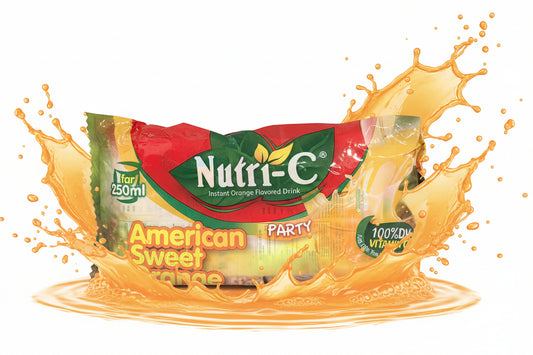 Packaged snack on a white surface with a cardboard box in the background