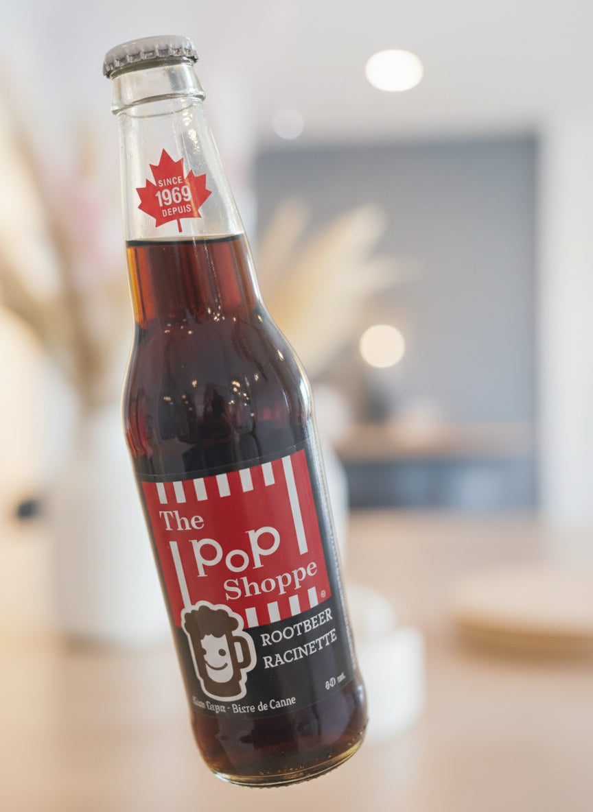 Bottle of pop in a refrigerator with visible branding