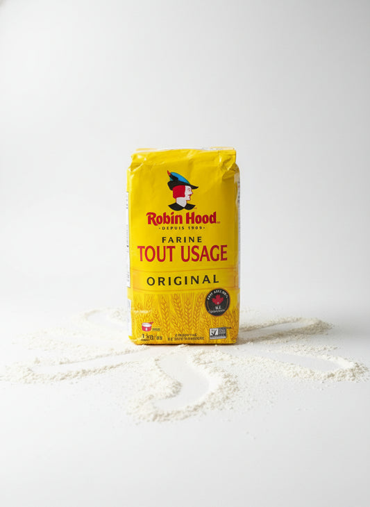 Bag of Robin Hood flour with branding and text on a white background